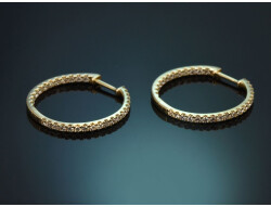 Elegant and classic diamond hoop earrings in 585 gold