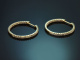 Elegant and classic diamond hoop earrings in 585 gold