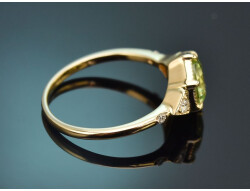 Elegant peridot ring with diamonds in 585 gold