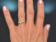 Elegant peridot ring with diamonds in 585 gold