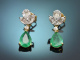 Classic diamond earrings with emerald teardrops in 750 yellow gold