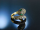 Schlangenring Gold 750 schwarze Diamanten Smaragde