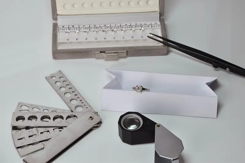 Professional tools for diamond grading on a white background